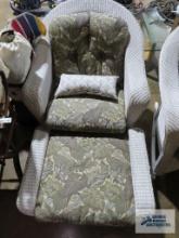 White wicker style chair and ottoman