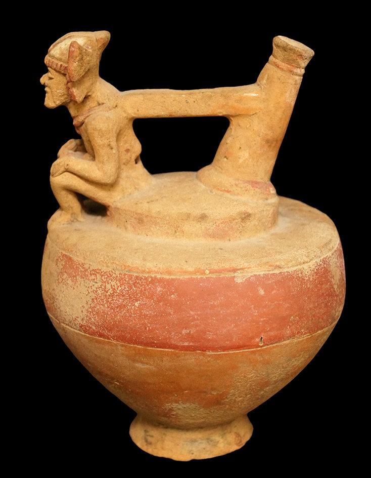 8 1/4" x 5 1/2" Whistle Vessel with a seated male figure- Chorrea Culture, Ecuador. Very early.