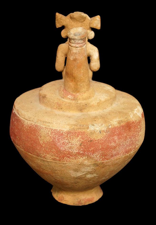 8 1/4" x 5 1/2" Whistle Vessel with a seated male figure- Chorrea Culture, Ecuador. Very early.