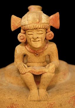 8 1/4" x 5 1/2" Whistle Vessel with a seated male figure- Chorrea Culture, Ecuador. Very early.