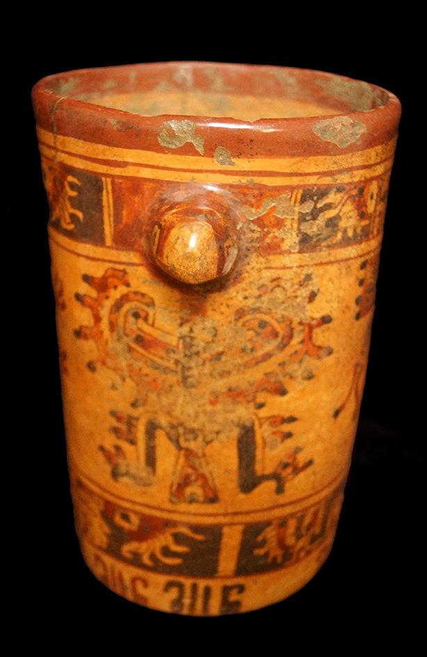 9 3/8" x 6 3/8"  Polychrome Mayan Cylinder with protruding Harpy Eagle heads.