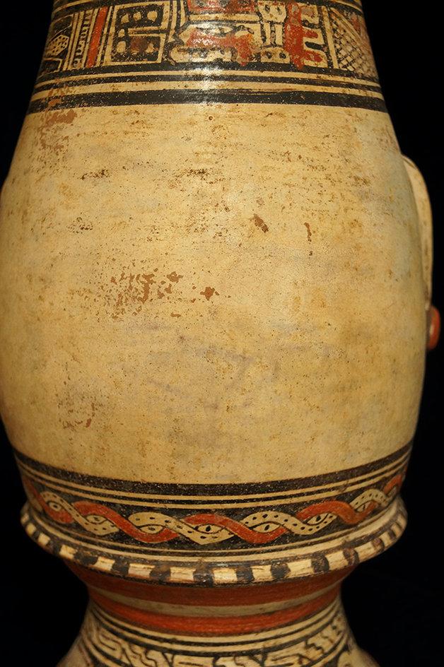 13 1/4" x  7 1/4" Pataky Polycrome Footed Urn from the Nicoya, Guanacaste area of Costa Rica.