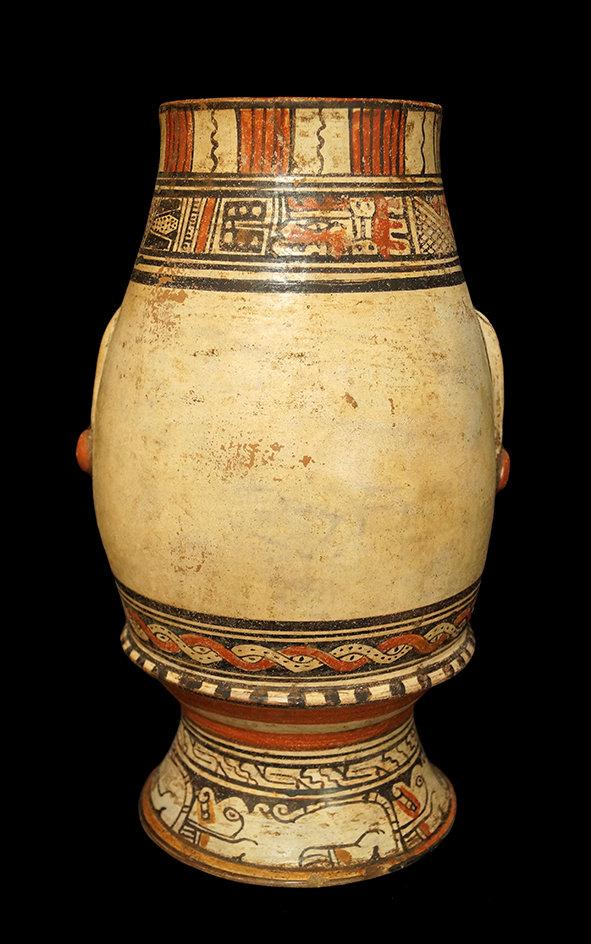 13 1/4" x  7 1/4" Pataky Polycrome Footed Urn from the Nicoya, Guanacaste area of Costa Rica.