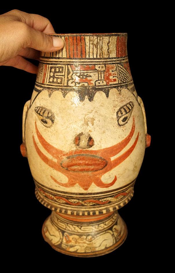 13 1/4" x  7 1/4" Pataky Polycrome Footed Urn from the Nicoya, Guanacaste area of Costa Rica.