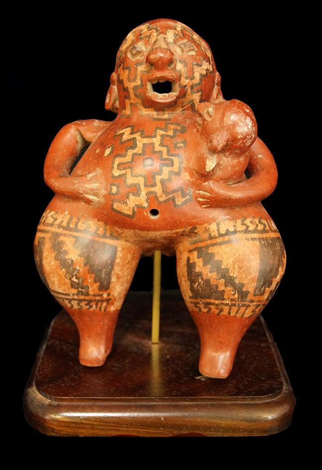 8 3/4" x 6" Chupicuaro figure of a mother holding a child with ornate geometric artwork. Mexico.