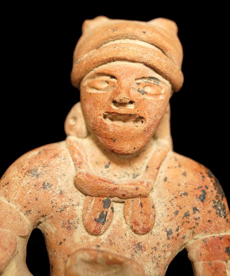 4 1/4"  x 2 3/8" PreColumbian Seated Figure w/cup. Nice detail - arm bands, necklace, ear spools.