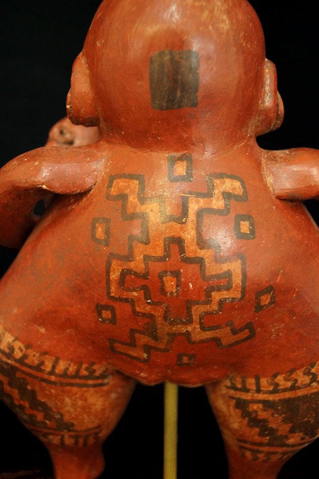 8 3/4" x 6" Chupicuaro figure of a mother holding a child with ornate geometric artwork. Mexico.