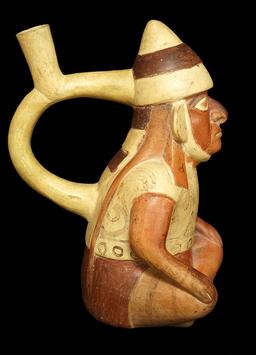 9" x 5" Moche Stirrup Bottle of a seated dignitary that is highly detailed, well crafted - Peru.