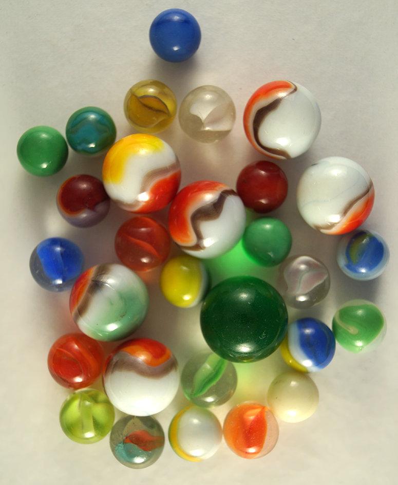 Group of 29 Assorted Marbles. Largest is 1".