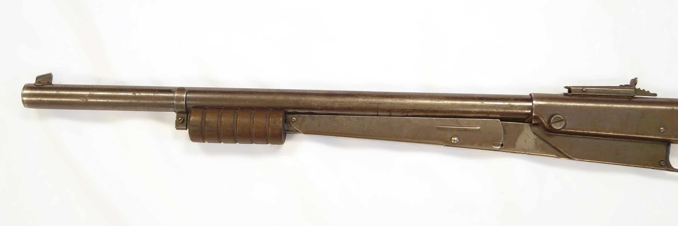 Daisy pump actionn BB Rifle with 4 tubes of Bbs.