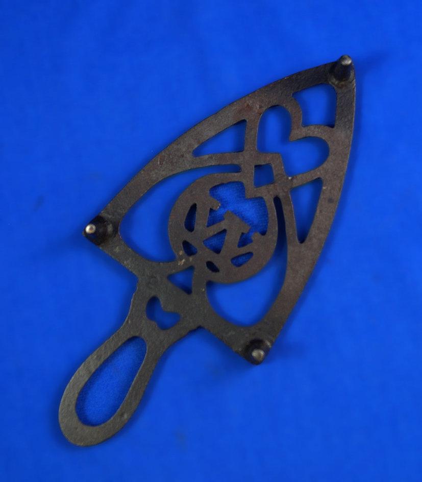 Trivet, circled W, 9" long