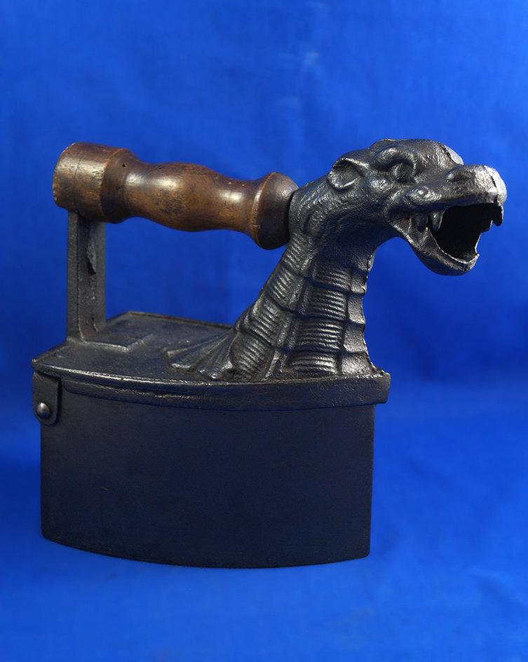 Serpent charcoal iron with head of Loch Ness monster, Germany, Ht 8 1/2", iron length 7"