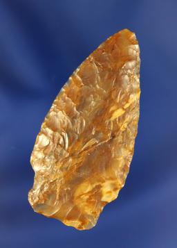 Shouldered Cascade Knife, 2 1/8” L, translucent, caramel colored Agate. Ex. Don Gillogly.