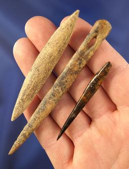 Set of three bone artifacts including a 4" Bone Needle, from the Bill Peterson Collection.