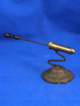 Small 19th century goffering iron with poker, round ornate base, brass barrel 2" long