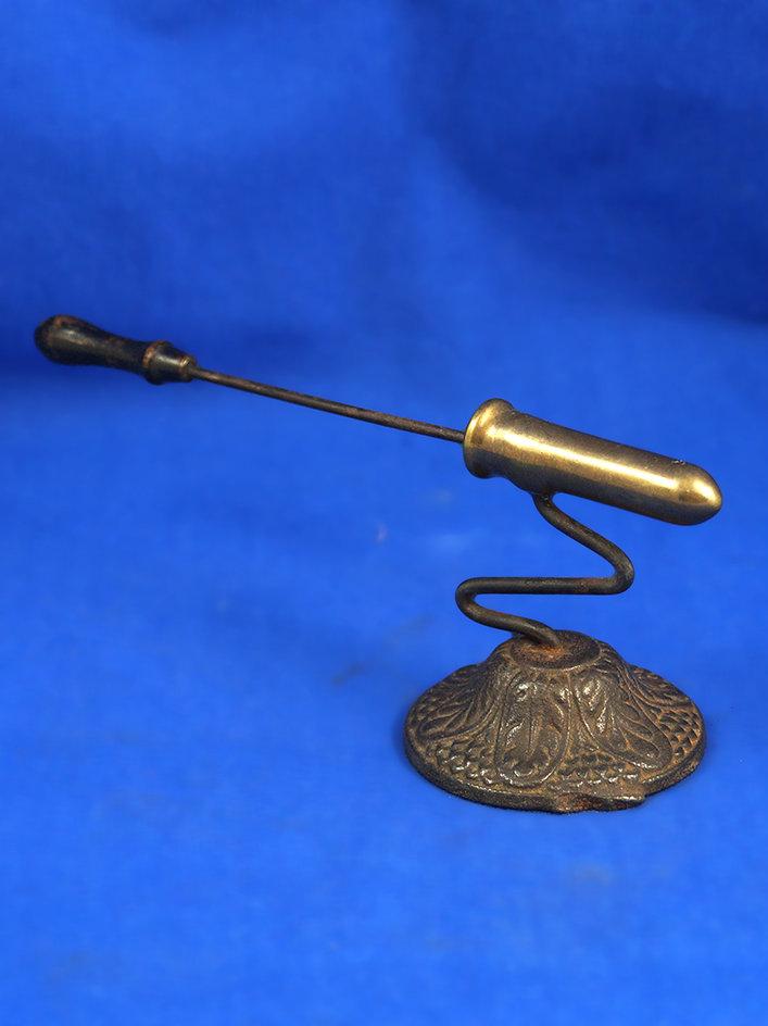 Small 19th century goffering iron with poker, round ornate base, brass barrel 2" long