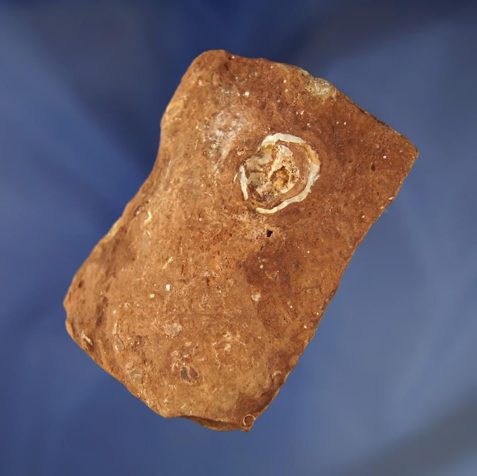 3 3/8" saddle style Bannerstone with a highly degraded surface found in northern Alabama.