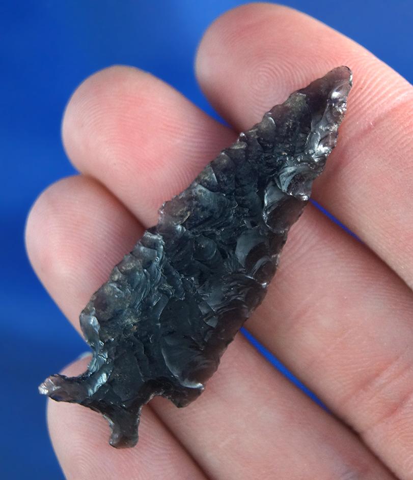 Excellent flaking on this 1 15/16" Obsidian Cornernotch point found in Oregon.