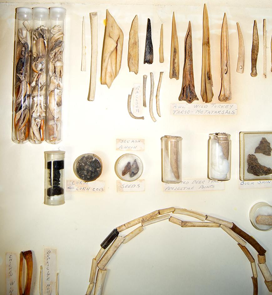 Large framed group of bone artifacts found at the South Park site in the Cuyahoga Valley, Ohio.