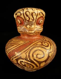 7" Tall Polychrome Spouted Jar with masked animal effigy.   Central Panama. Schmitt COA.