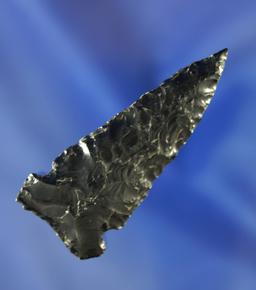 2 1/16" Lookingbill point made from black obsidian in nice condition. Wyoming.