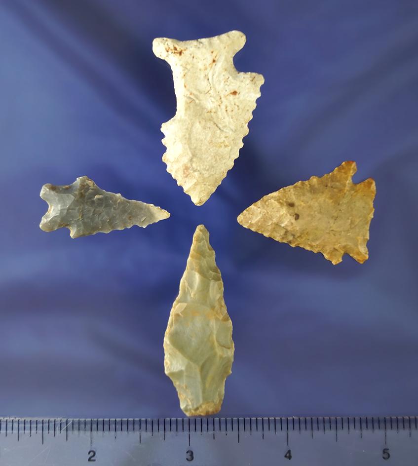 Set of four assorted arrowheads found in Kentucky. Largest is 1 7/8". One is uniquely salvaged.