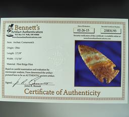 2 7/8" Flint Ridge Flint Archaic Cornernotch that is very colorful found in Ohio. Bennett COA.