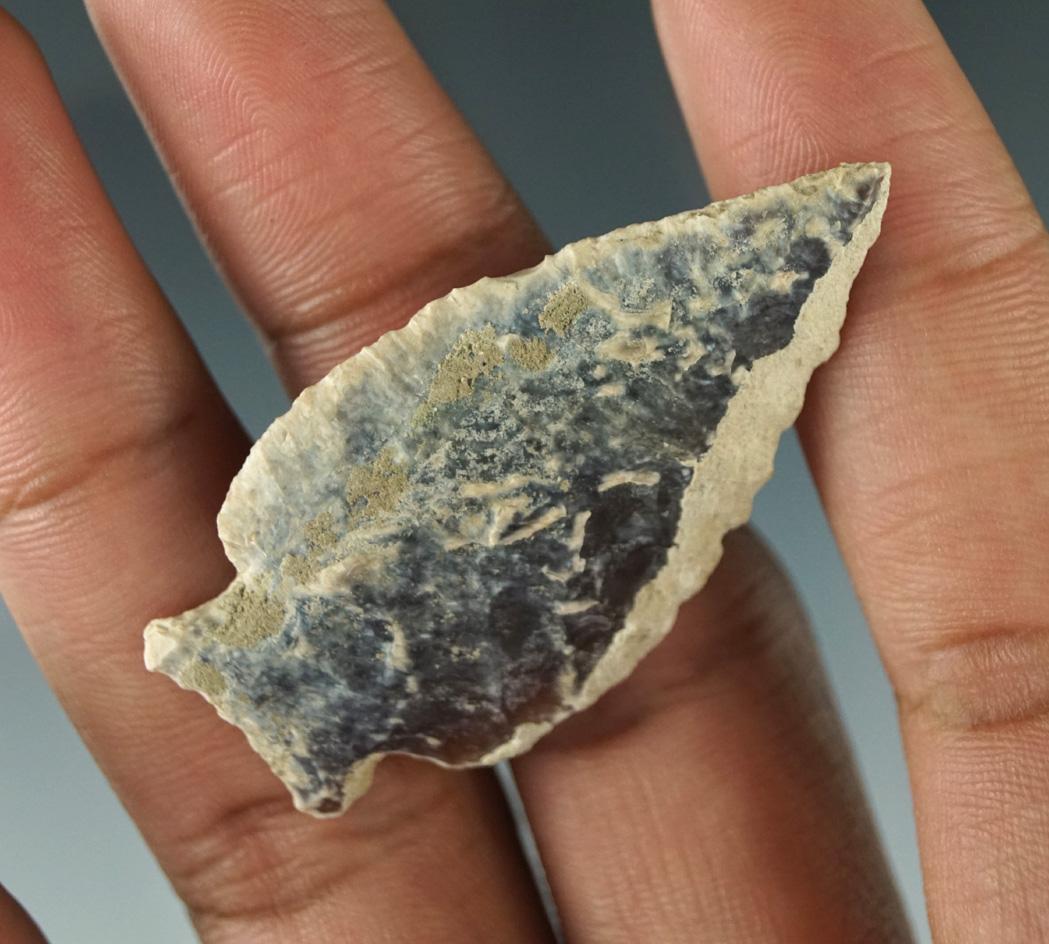 Heavily patinated 2 1/16" Knife River Flint point found in the Dakotas.