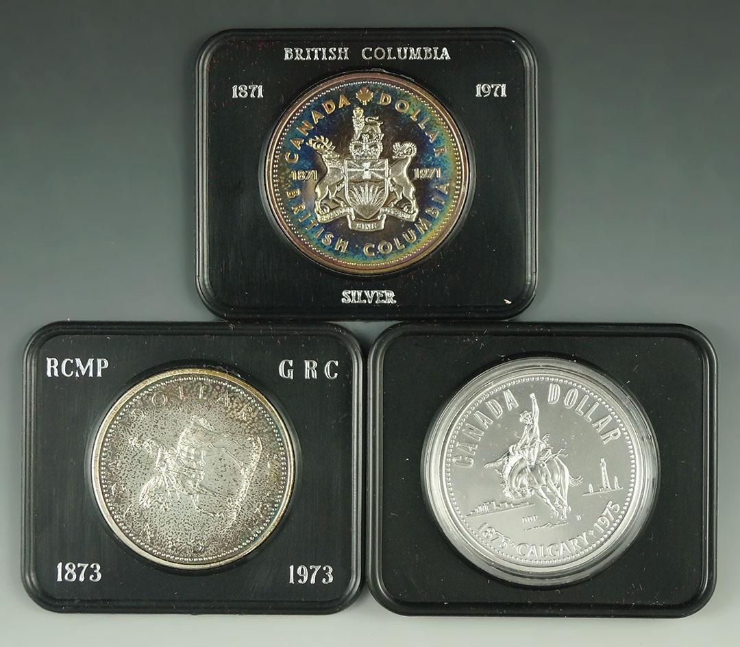 1971, 1973 and 1975 Canadian 50% Silver Commemorative Dollars in Original Holders