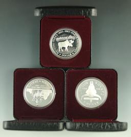 1982, 1985 and 1987 Canadian 50% Silver Commemorative Dollars in Original Holders