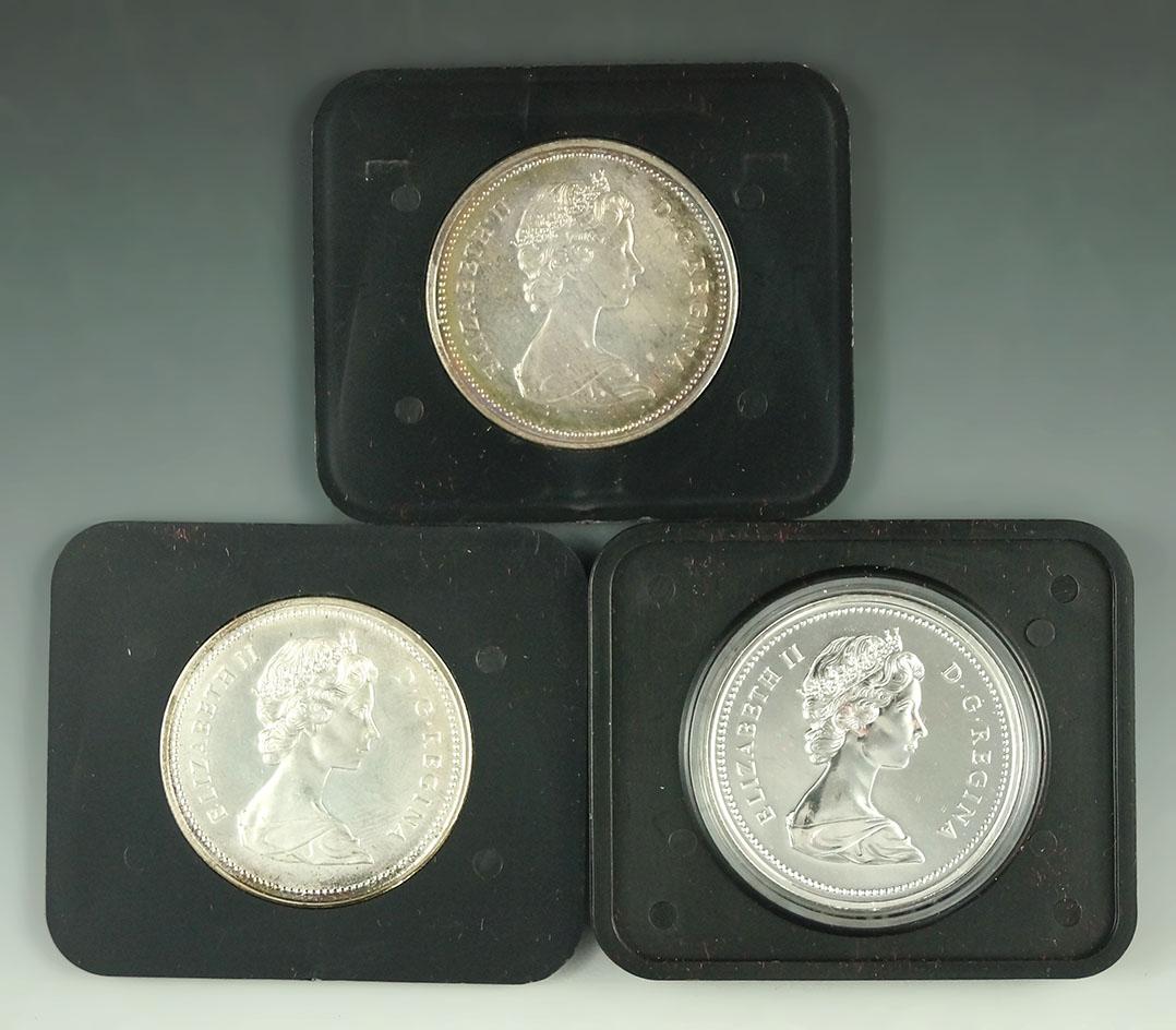 1971, 1973 and 1975 Canadian 50% Silver Commemorative Dollars in Original Holders