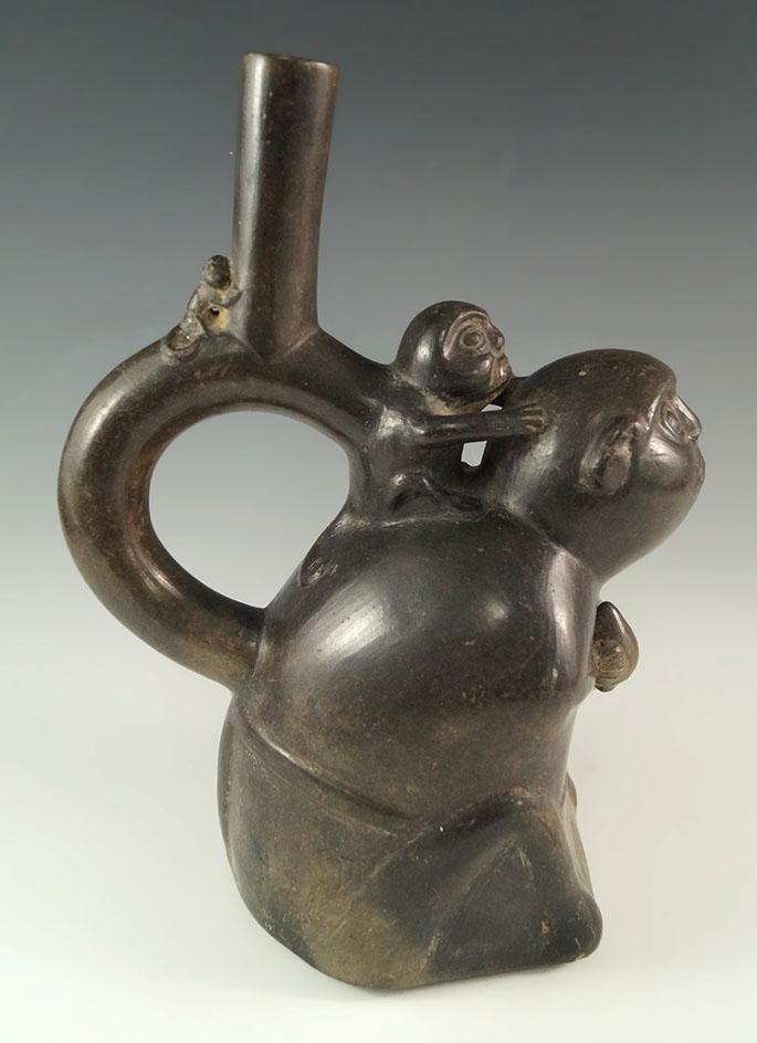 9 3/4" by 7" Chimu monkey effigy stirrup bottle from Peru. Deaccessioned Museum Artifact!