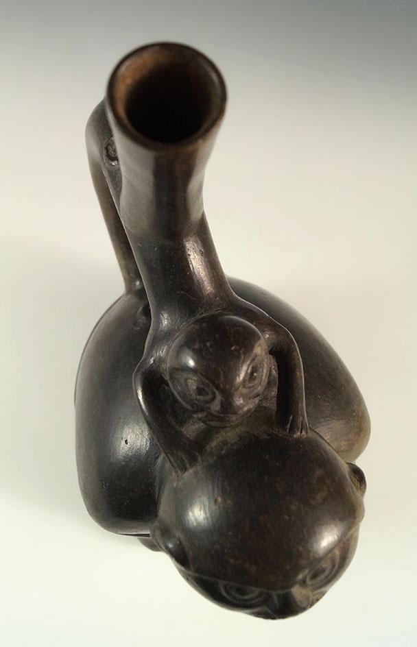 9 3/4" by 7" Chimu monkey effigy stirrup bottle from Peru. Deaccessioned Museum Artifact!