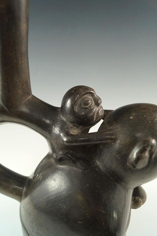 9 3/4" by 7" Chimu monkey effigy stirrup bottle from Peru. Deaccessioned Museum Artifact!