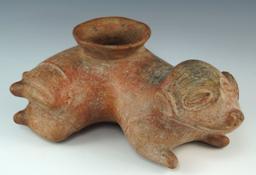 10" long Colima dog effigy pottery vessel. Found in west Mexico. Ex. Roy Pohler collection.