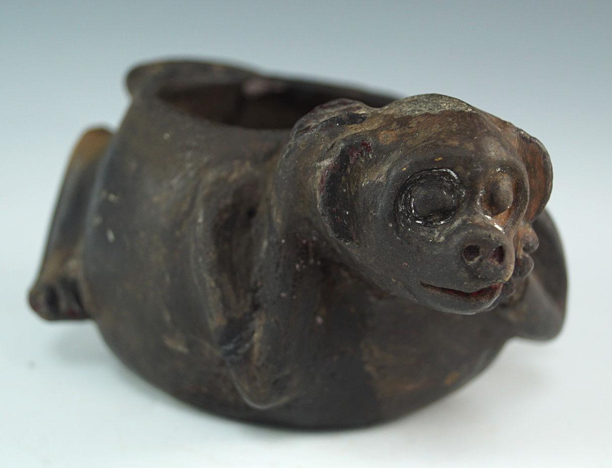 Mayan blackware monkey effigy bowl that is 5 1/2" wide with minor restoration. Ex. Robert Sonn