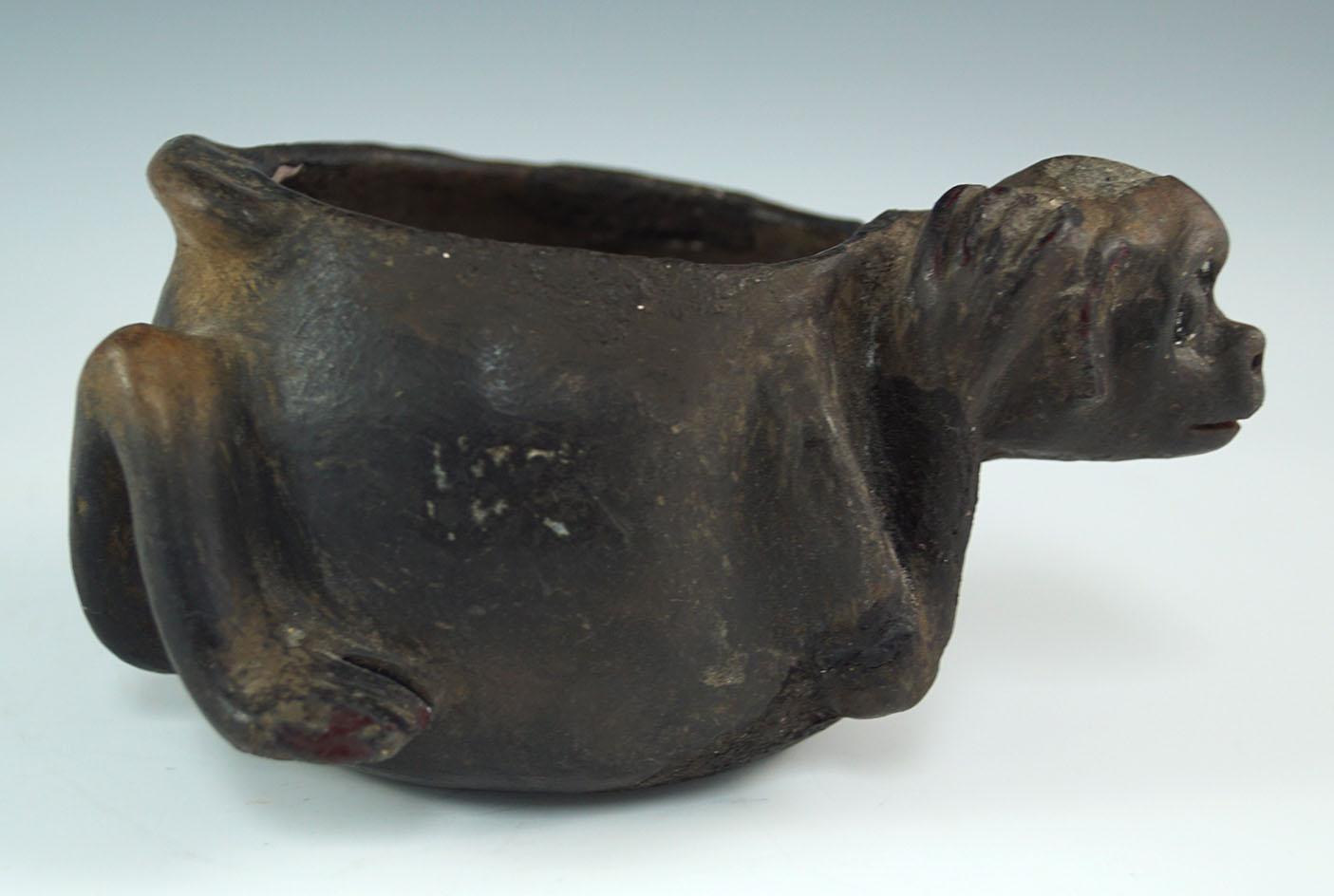 Mayan blackware monkey effigy bowl that is 5 1/2" wide with minor restoration. Ex. Robert Sonn