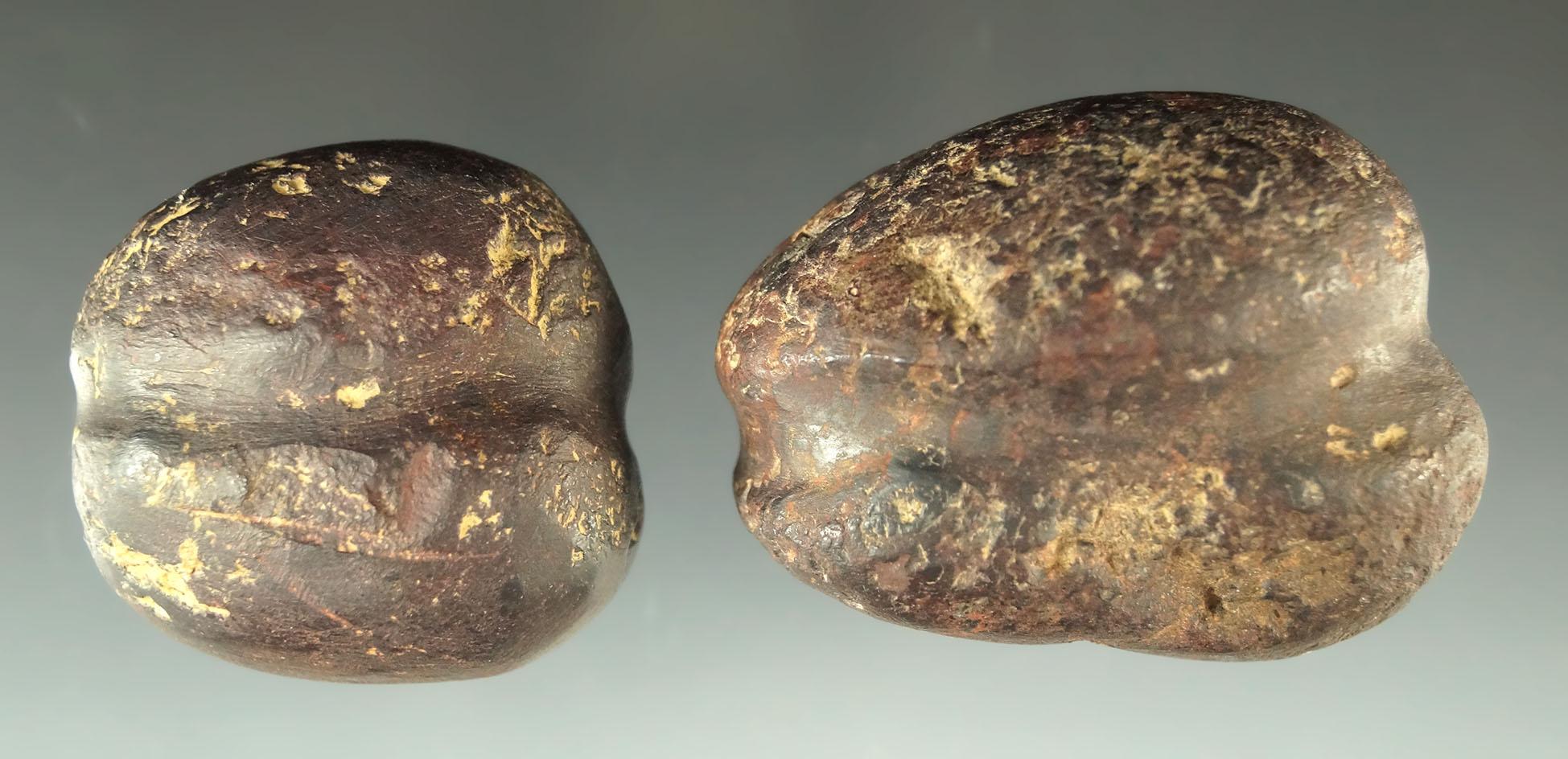 Pair of fully grooved weights made from hematite found in Ohio, largest is 2 1/16".