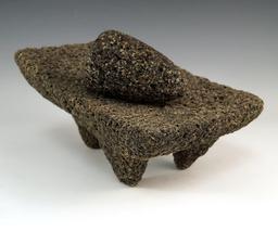 8 1/4" by 4 1/8" Tall Tri-leg Matate with grinding stone made from Lava Rock, found in Mexico.