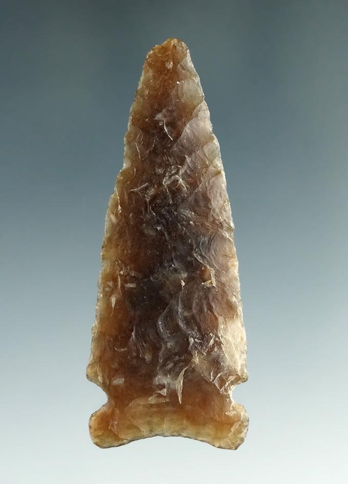 2 7/16" very thin and nicely flaked Sidenotch point made from Knife  River Flint, South Dakota.