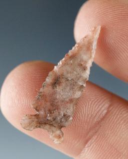 1 1/16" Arrowhead made from mottled pink and cream material, found in California.