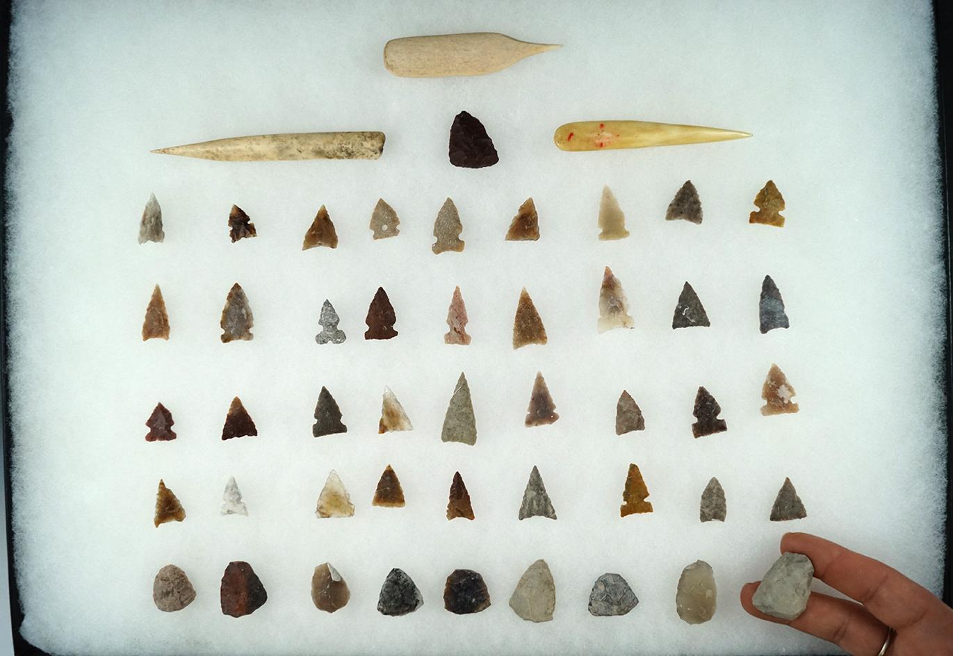 Large group of Projectile Points, 3 Bone Awls and Scrapers found in the High Plains Region.