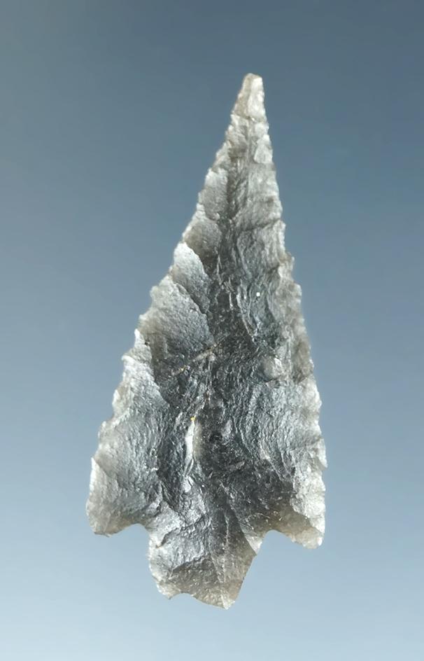 1 1/8" Stemmed arrowhead with beautiful flaking, style and quality material, found in California.