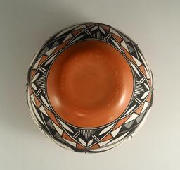 5 1/4" Tall contemporary Southwest style pottery jar that makes a nice display item.