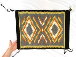 18" by 24.5" genuine Navajo Indian rug made from 100% virgin wool.