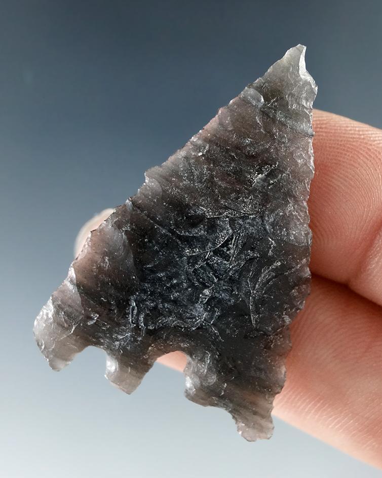 Unique anciently salvaged base on this 1 9/16" obsidian point found in Humboldt Co., Nevada.