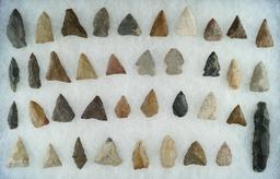 Large group of approximately 38 assorted arrowheads from various locations. Largest is 2 7/8".