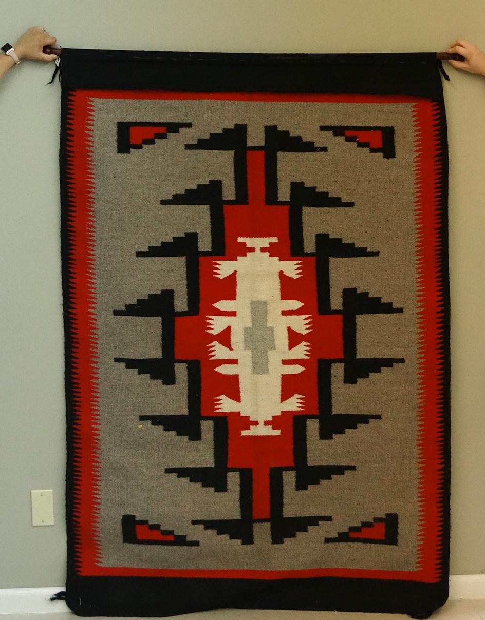 69" by 45" nicely woven large Navajo rug - excellent condition - makes a beautiful wall hanging.