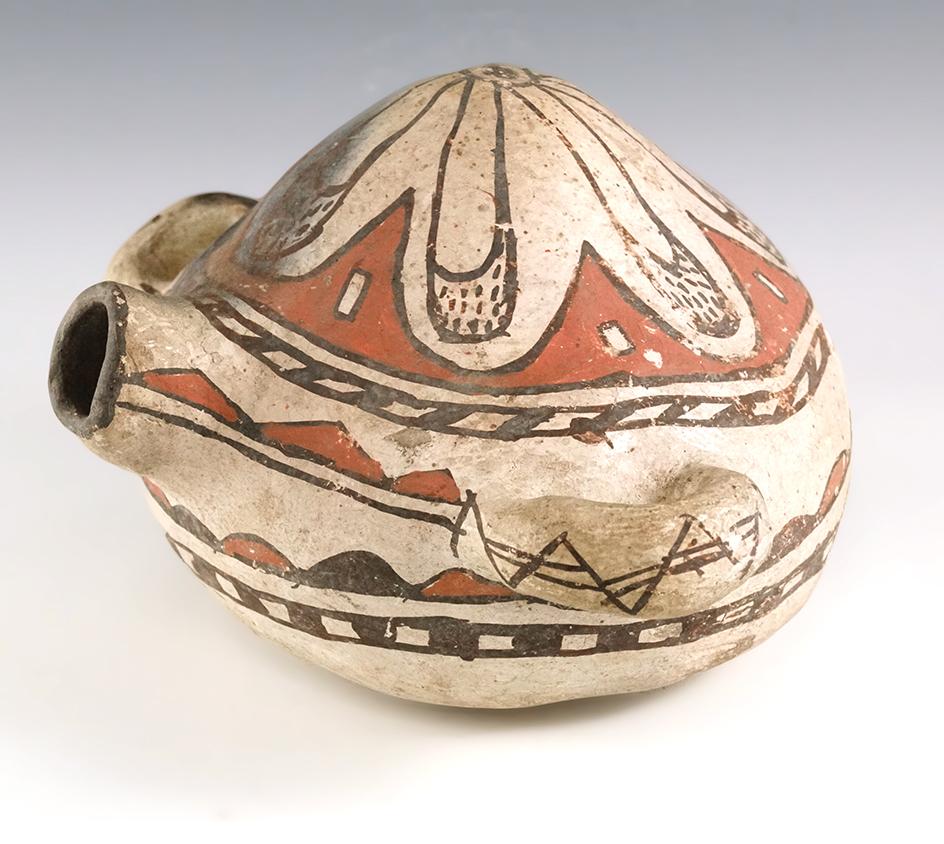 Beautifully decorated 9 1/4" wide Zuni Pueblo canteen from New Mexico.