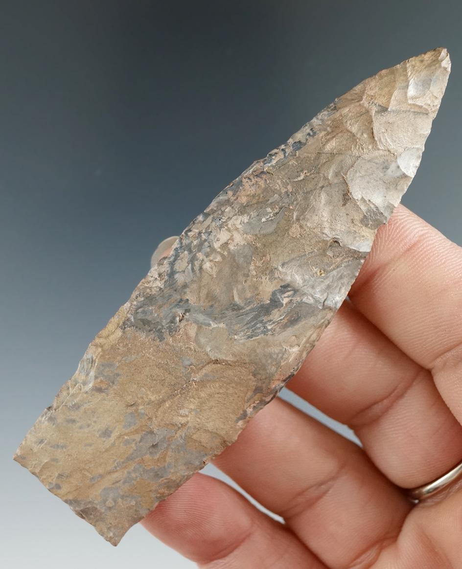 3 1/2" Paleo lanceolate found in two pieces with restoration to a missing center section.